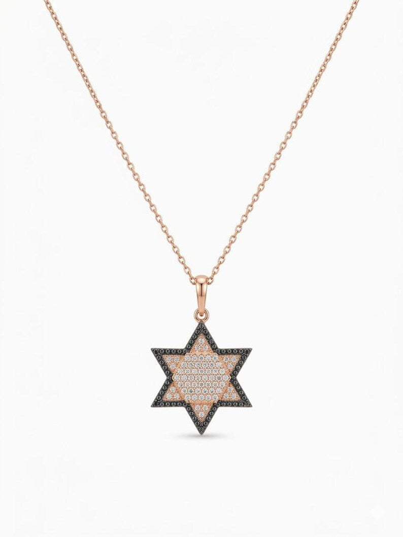 A rose gold Star of David pendant necklace on a delicate rose gold chain, set against a clean white background.