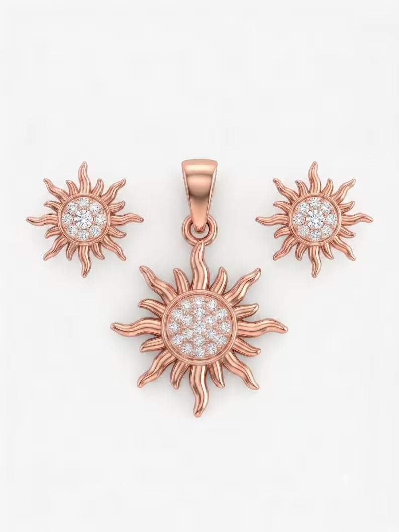Rose gold jewelry set featuring a central sun pendant and two matching sun-shaped stud earrings, each with a pavé diamond center, displayed on a clean white background.