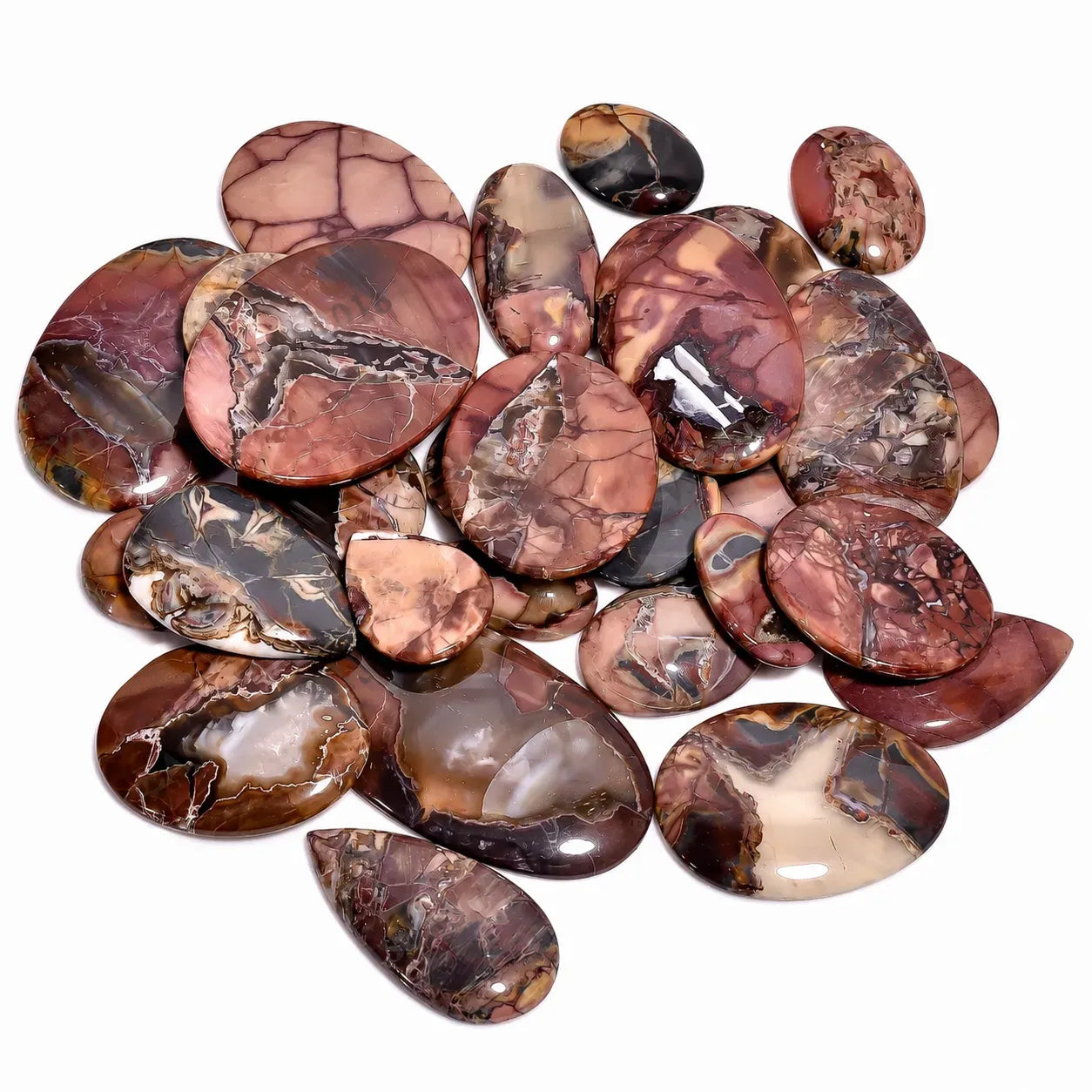 Collection of marbled brown and black stones on a white background