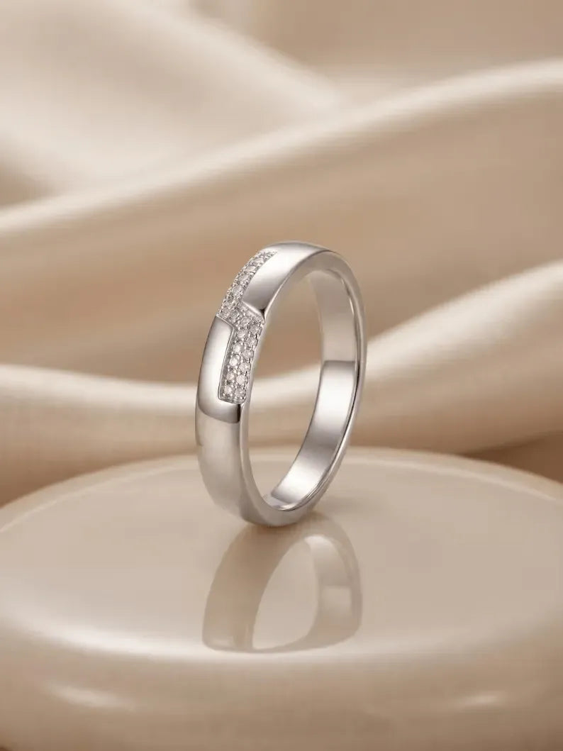 Side angle view of 925 sterling silver pave band ring with pave stone detail
