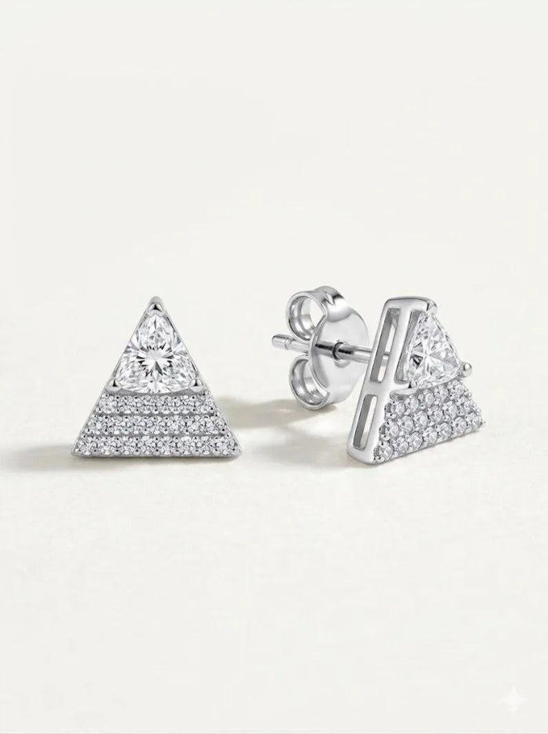 Sterling silver triangle statement stud earrings, flat lay view