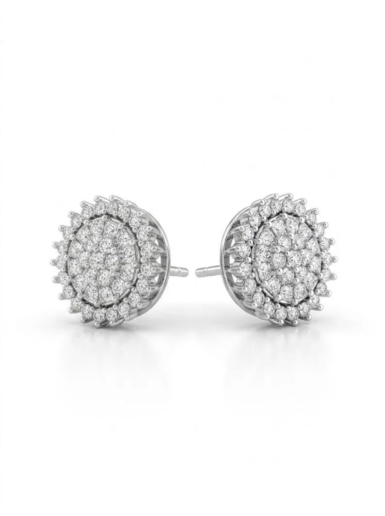 A pair of round stud earrings with pavé-set clear stones in a silver-toned metal, shown on a clean white background.