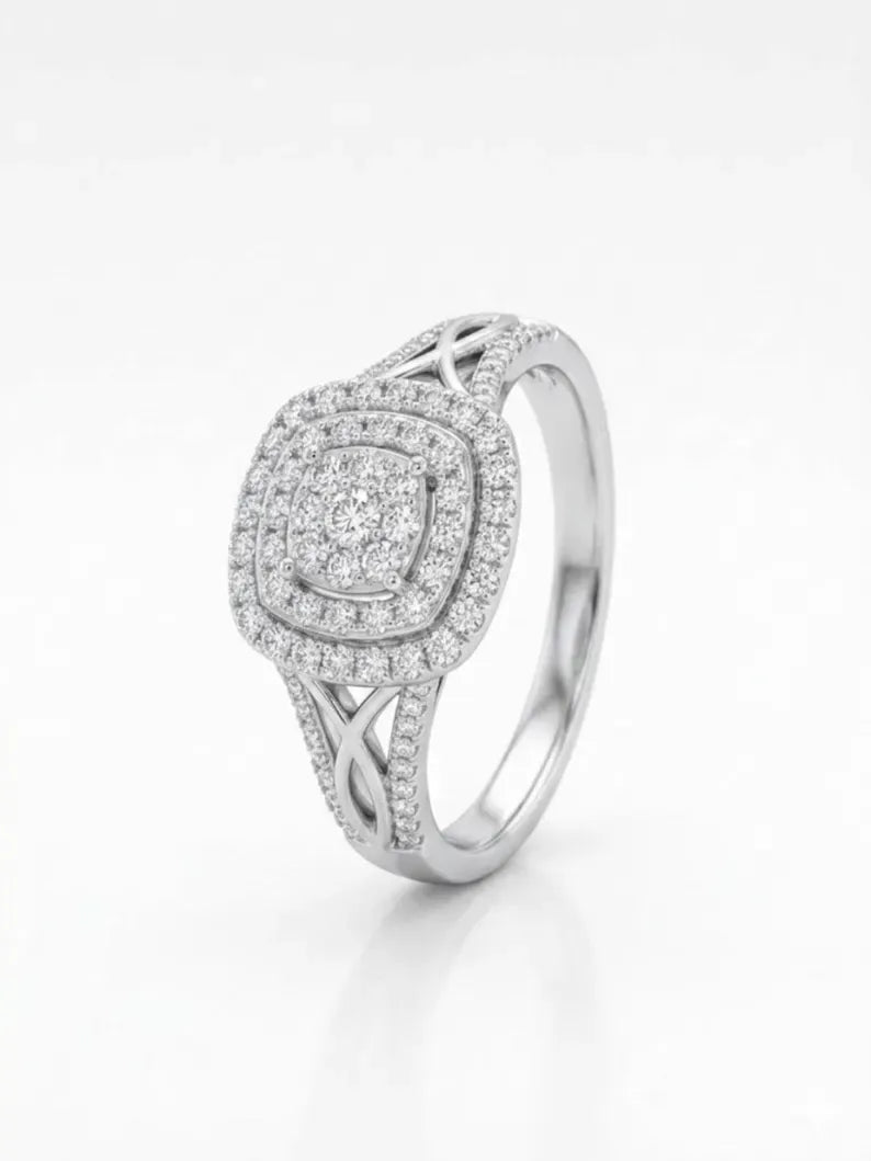 Front-facing product shot of sterling silver square halo ring with split shank