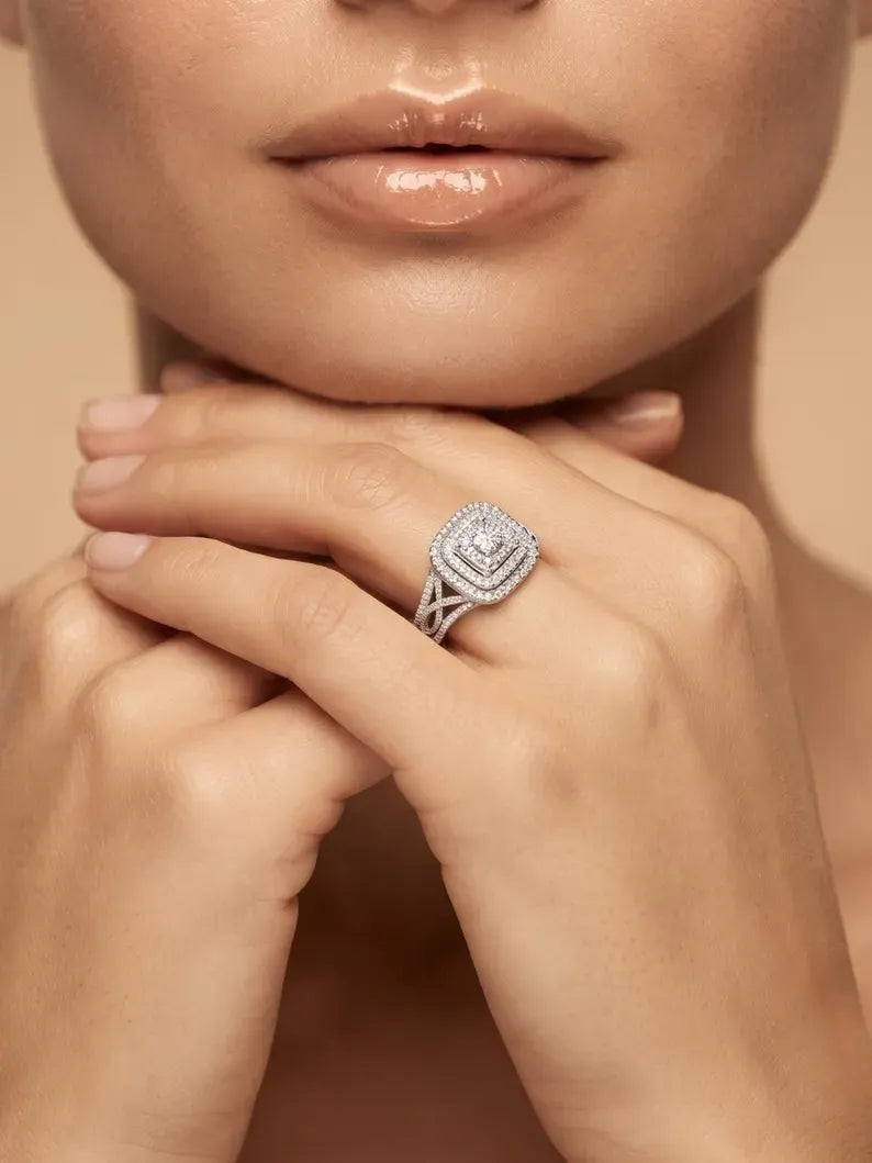 Woman's clasped hands showing sterling silver pave halo cocktail ring