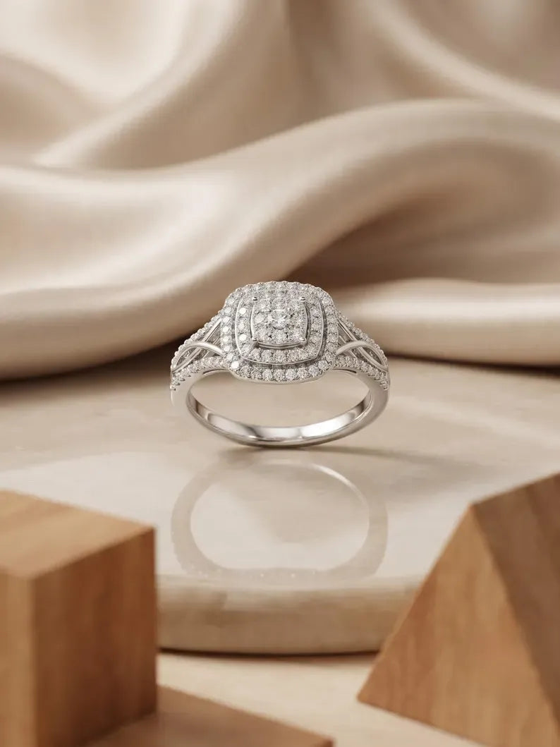 Silver square halo pave ring styled on stone surface with wooden decor
