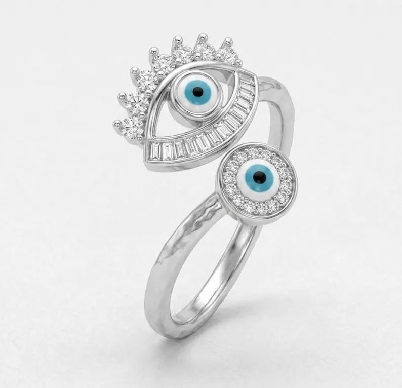 Sterling silver evil eye open bypass ring with CZ accents, unique protective eye jewelry design for women