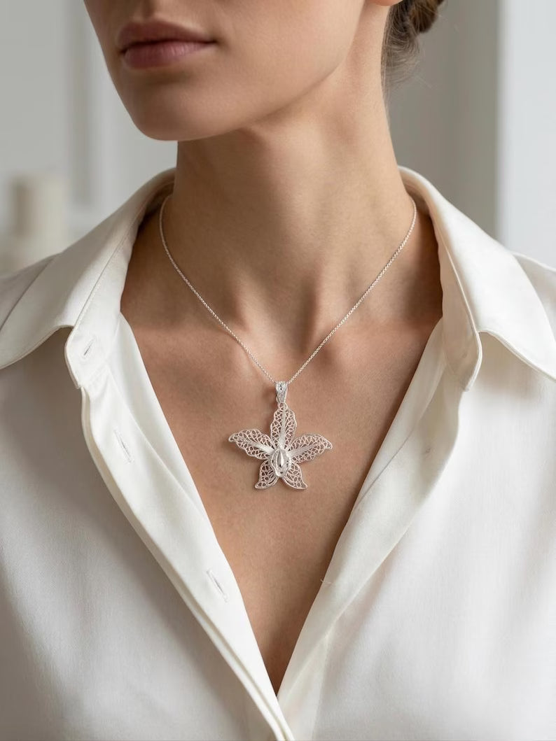Full view of sterling silver openwork flower necklace
