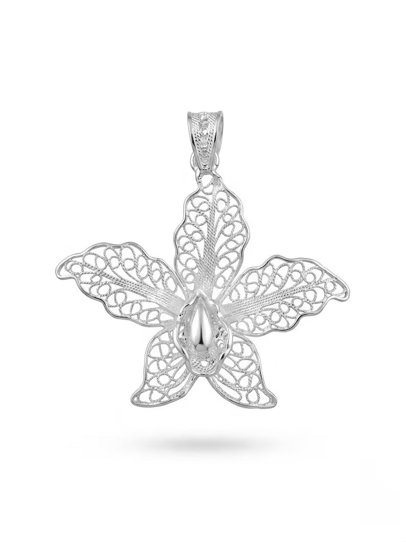 A silver filigree orchid pendant with a textured bail, shown on a clean white background with a soft shadow underneath.