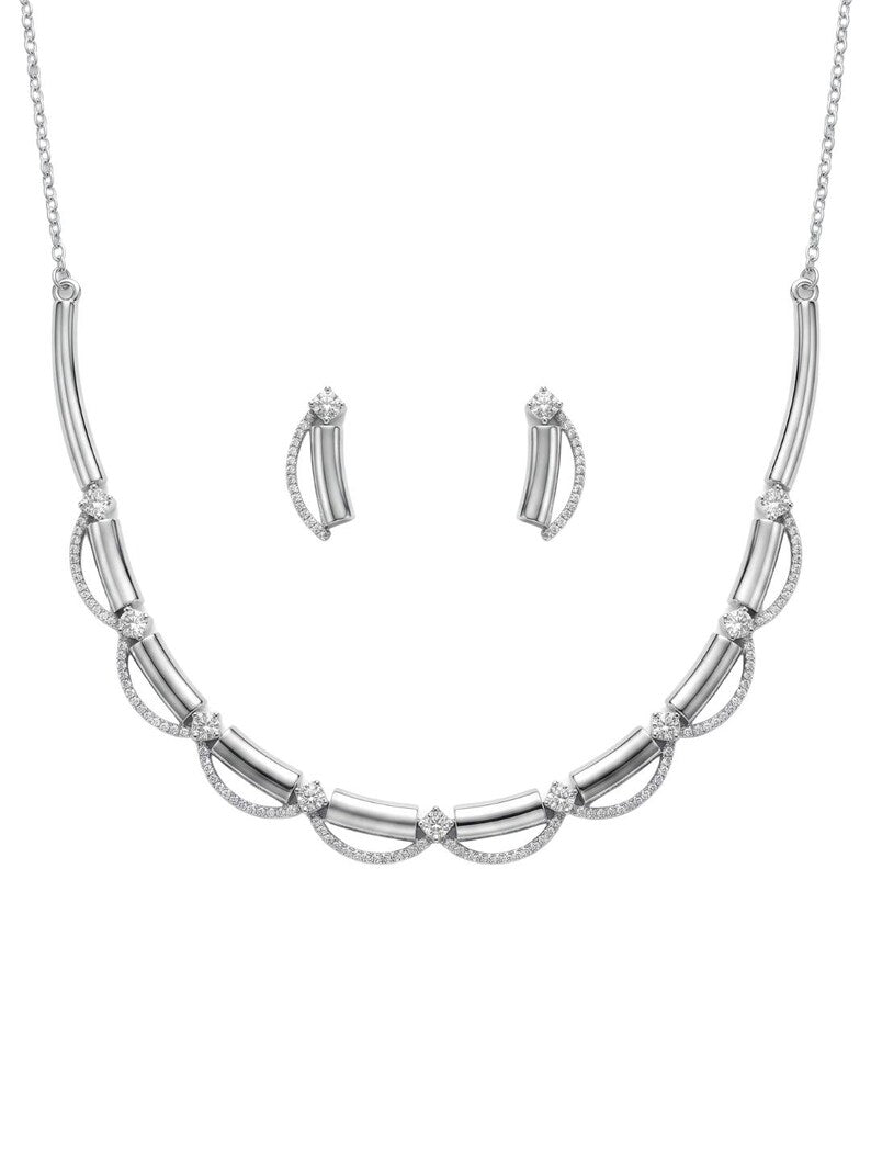 A silver-toned jewelry set featuring a curved collar necklace and matching drop earrings, both adorned with small clear stones, shown on a plain white background.