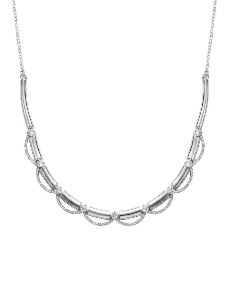 A silver-toned necklace featuring a curved row of polished tube links interspersed with small oval clusters of clear stones, suspended from a fine chain against a plain white background.