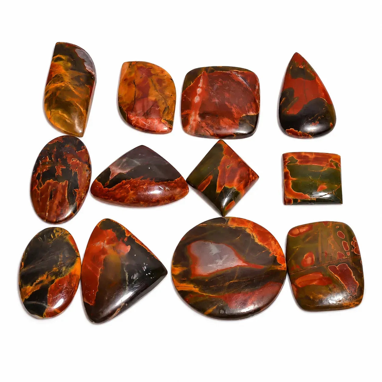 Collection of red and brown marbled stones on a white background