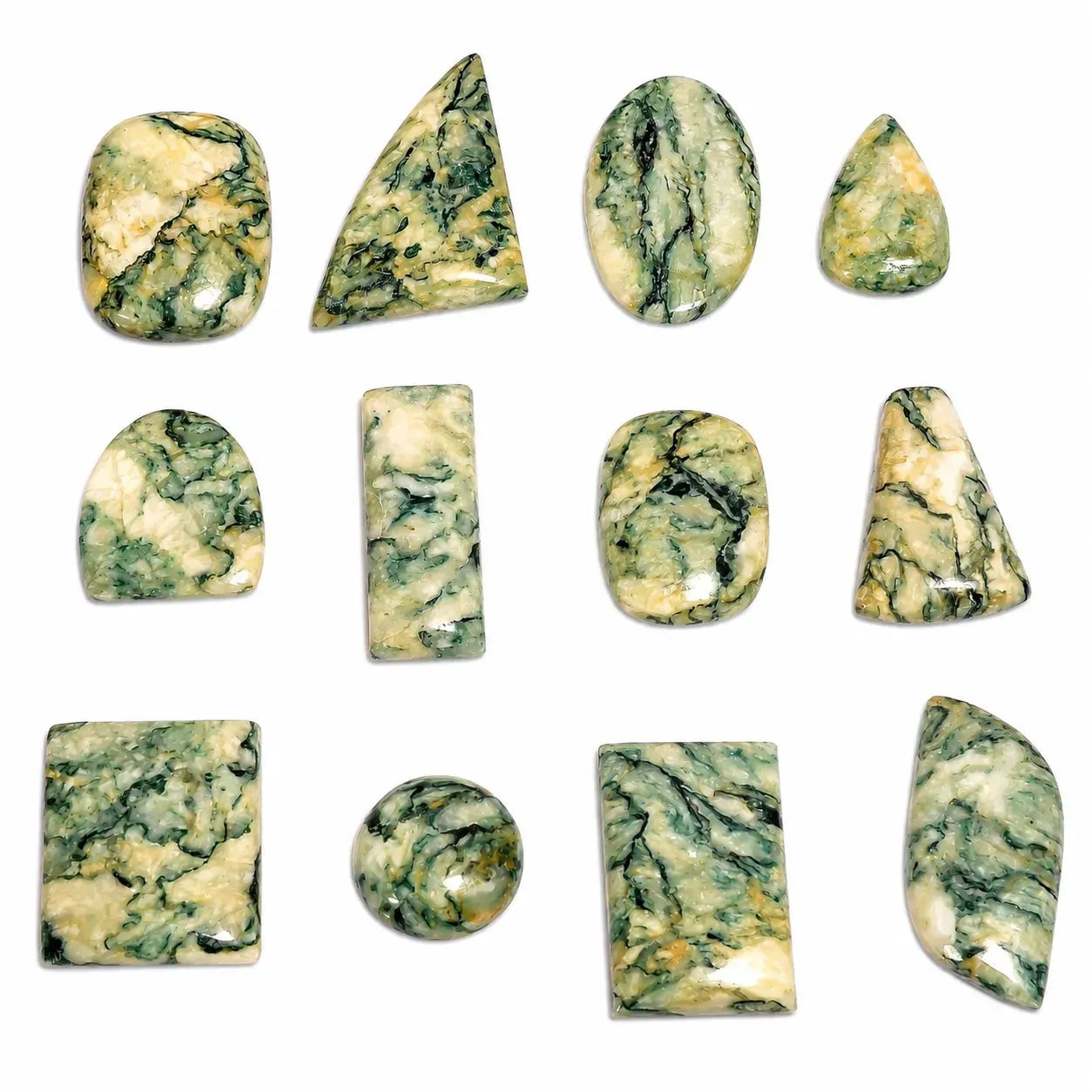 Collection of green and white marbled stones on a white background